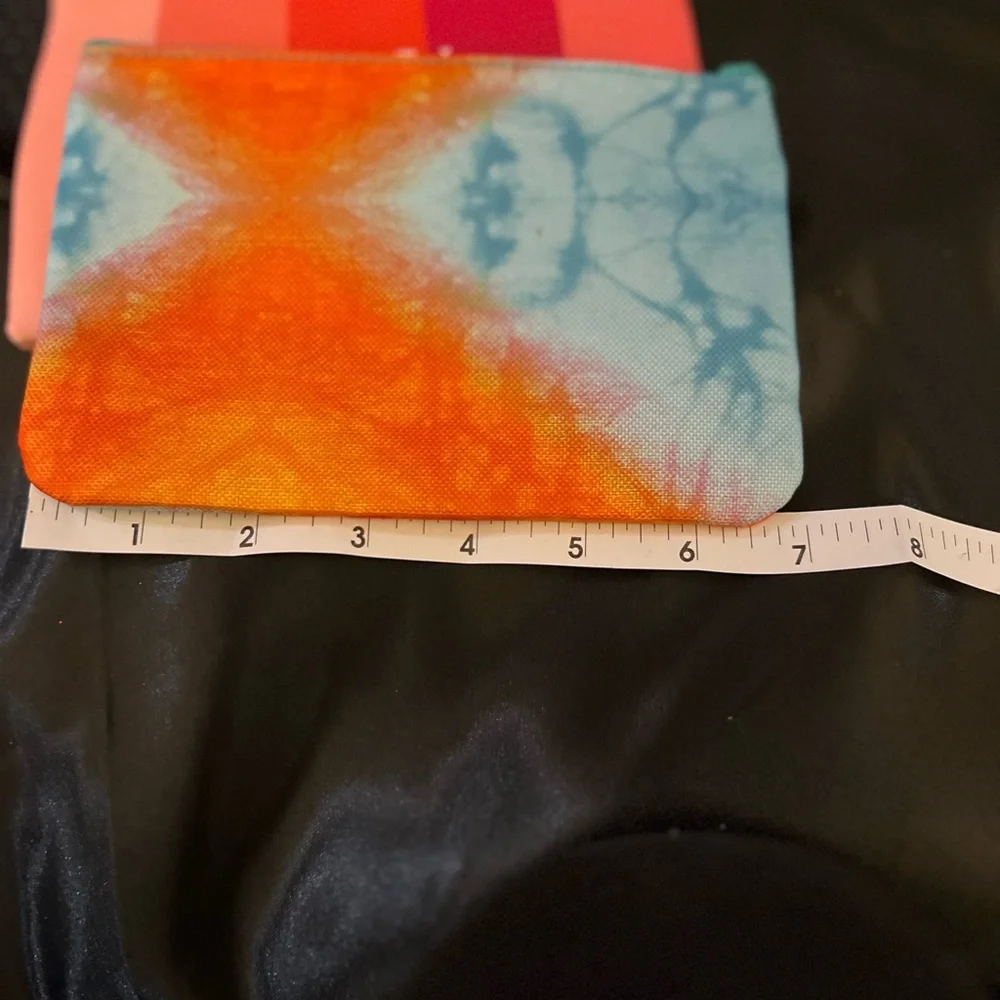 Four never used Ipsy cosmetic bags. Great for your girls birthday parties.